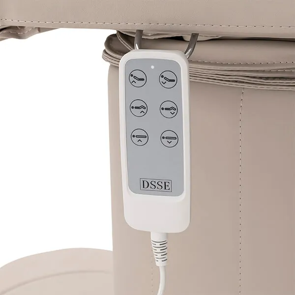 gaia-lash-bed-latte-hand-remote-close-up.webp